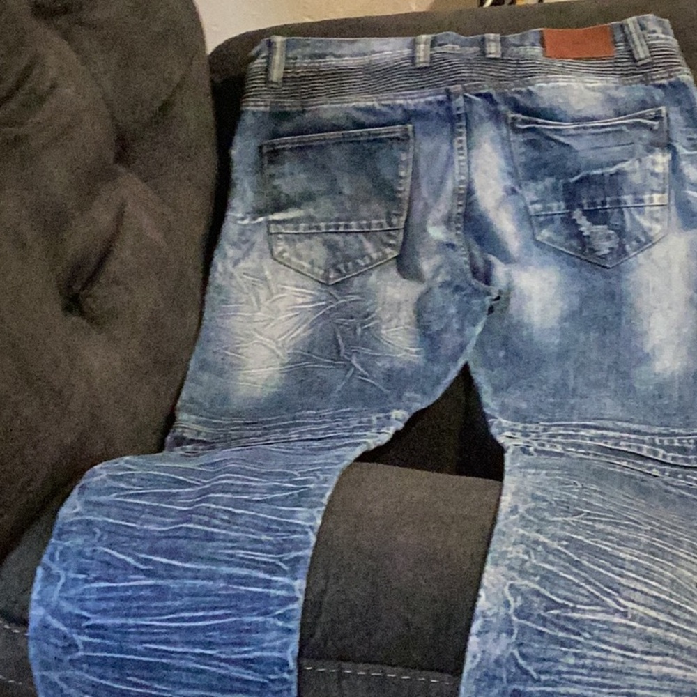 Men’s m-x jeans with holes and fabric underneath it in fact, only worn twice